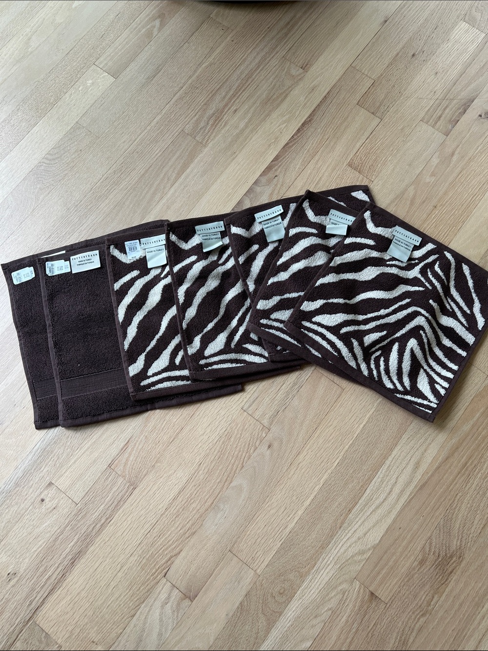 Pottery Barn Brown and Cream Zebra Print (5). Brown (3) washcloths